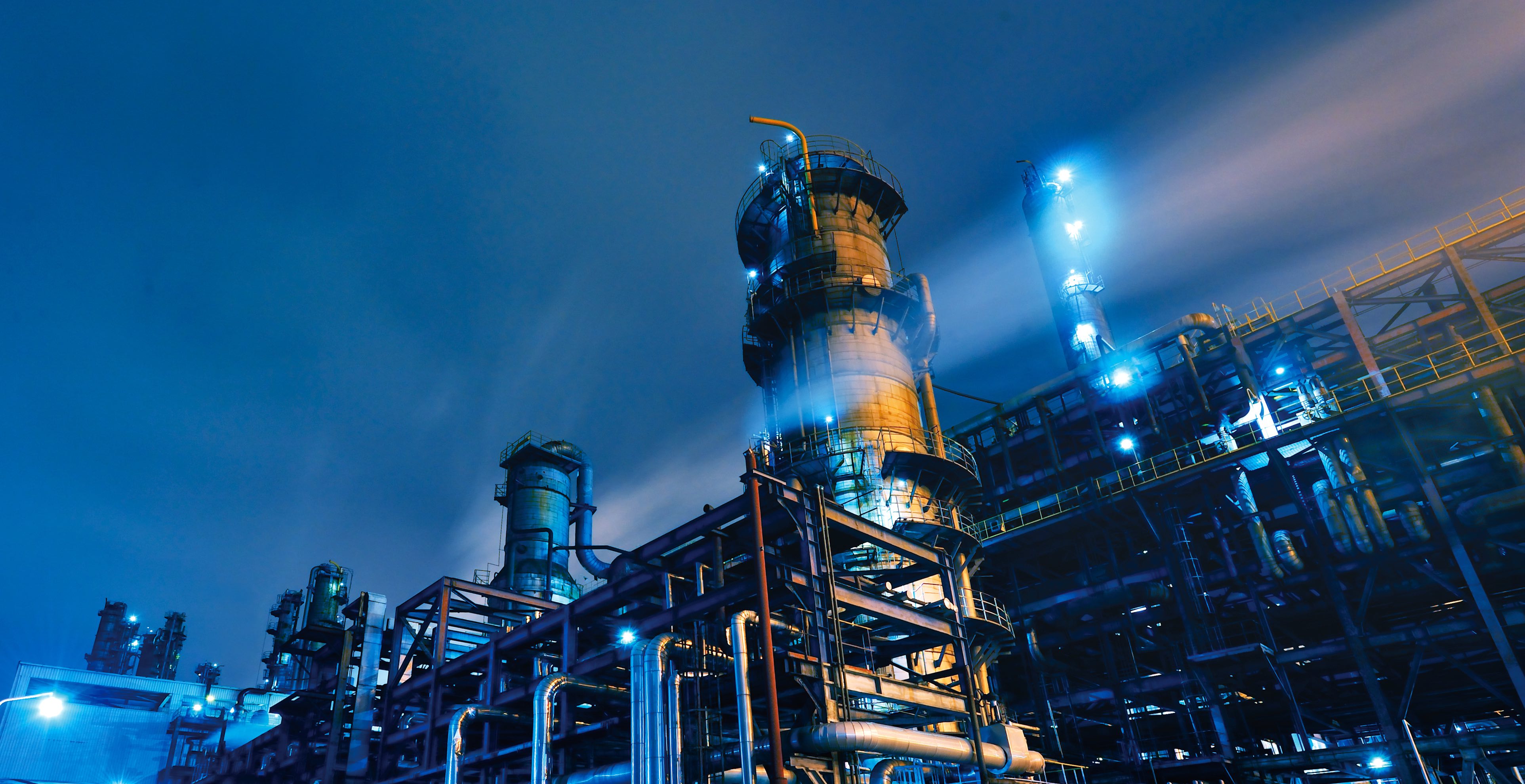 Oil Refinery, Chemical & Petrochemical plant abstract at night.